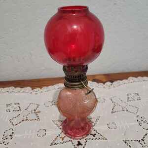 Vtg Mini Oil Lamp Cranberry glass globe with fish bottom RARE Flaw Old World